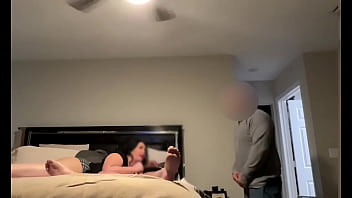 wife watches husband with a man